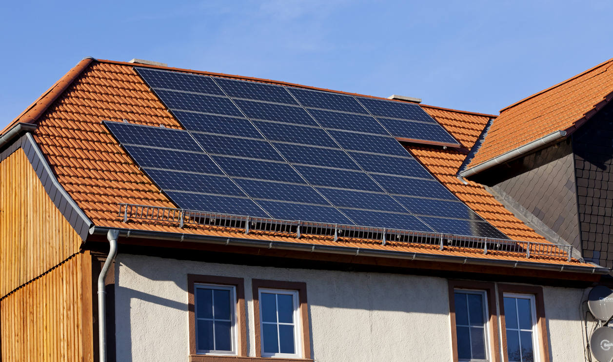 Solar,Power,Photovoltaic,Energy,Panels,On,Tiled,House,Roof